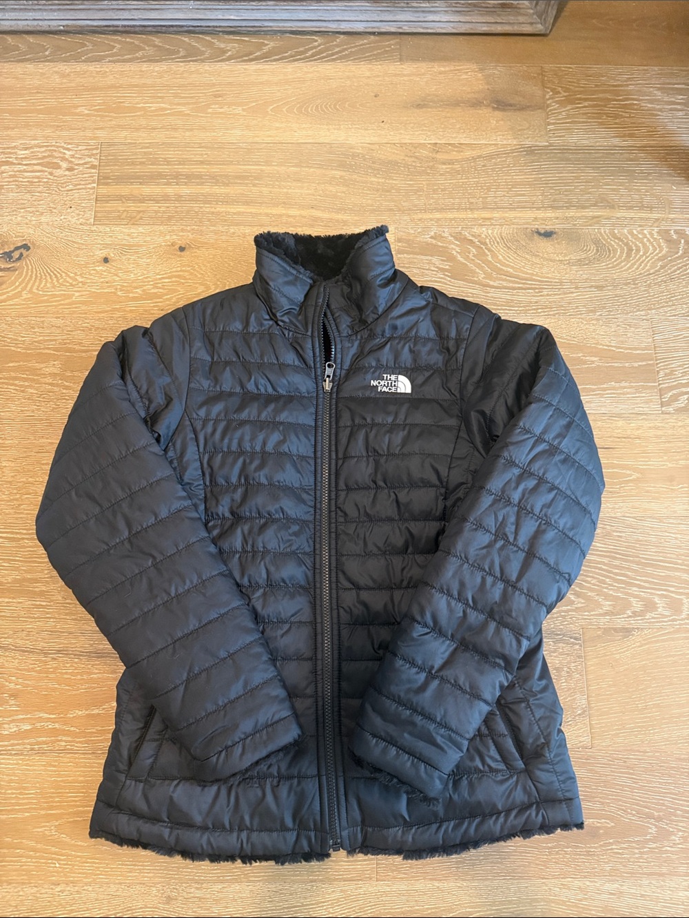The North Face Girl’s Black Puffer Jacket with Logo Reversible